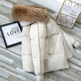 Ella® | Winter coat with faux fur hood